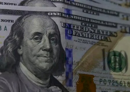 D&oacute;lar fecha a R$ 5 e bolsa sobe com negocia&ccedil;&otilde;es entre EUA e Ir&atilde;